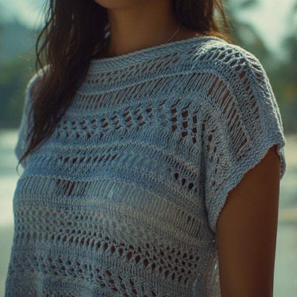 Metallic blue hand knit beach cover up lightweight coastal knitwear