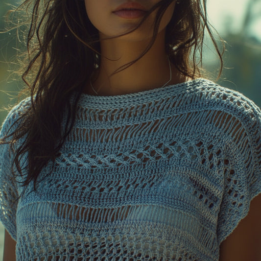 Metallic blue hand knit beach cover up lightweight coastal knitwear