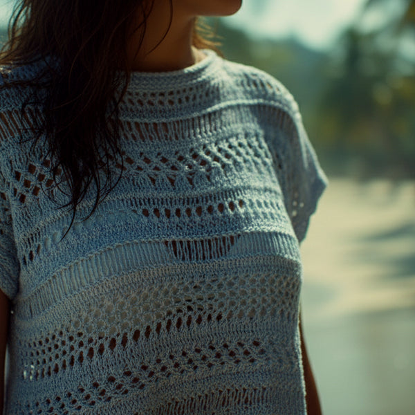 Metallic blue hand knit beach cover up lightweight coastal knitwear